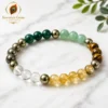 dhan-yog-bracelet-natural-gemstones-marble Dhan Yog Bracelet with Citrine, Pyrite, Green Aventurine, Green Jade, Clear Quartz and Tiger Eye on white marble | Sawariya Gems
