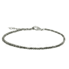 Women's pyrite beaded anklet with faceted natural gemstone beads, silver-tone , and extender chain on white background.