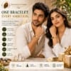 dhan-yog-gold-bracelet-unisex-lifestyle Man and woman wearing Dhan Yog Gold Bracelet with five natural wealth crystals for prosperity, confidence and daily wear.