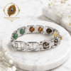 divine-healing-bracelet-product-shot-sawariya-gems Premium Divine Healing Bracelet with natural gemstones by Sawariya Gems on white marble background for positive energy and protection.