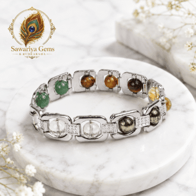 Premium Divine Healing Bracelet with natural gemstones by Sawariya Gems on white marble background for positive energy and protection.