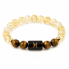 pisces-meen-rashi-zodiac-bracelet-white-background-product Pisces (Meen Rashi) Zodiac Bracelet with Natural Citrine and Tiger Eye 8mm beads isolated on a white background for product listing.