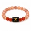 Taurus (Vrishabh Rashi) Zodiac Bracelet with natural Sunstone and Carnelian 8mm beads on white background for premium product photography.