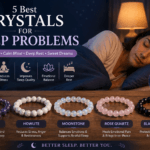 Five crystals for sleep problems displayed beside a peaceful bedroom, representing calm, stress relief, emotional balance and restful sleep.