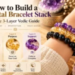Crystal bracelet stack featuring black tourmaline, citrine, and amethyst, illustrating the three-layer Vedic guide to foundation, purpose, and support.